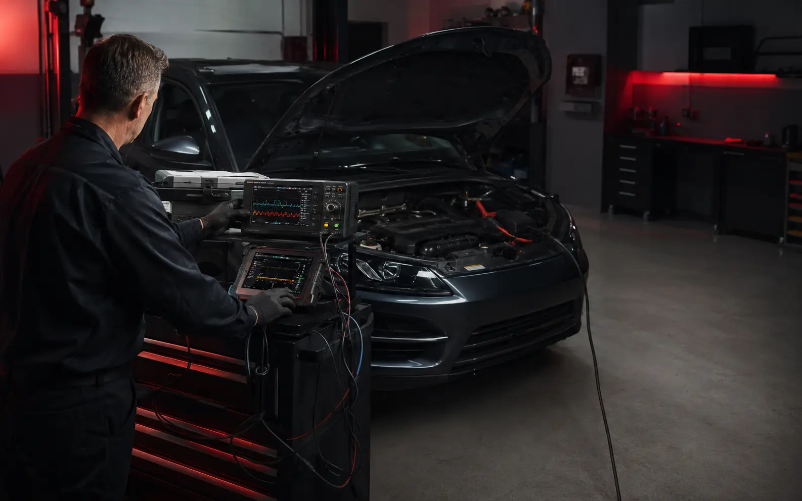 Technician using diagnostic equipment at Albion Auto Service